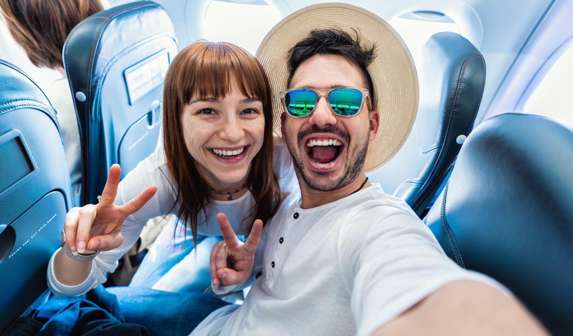 Happy,Tourist,Taking,Selfie,Inside,Airplane,-,Cheerful,Couple,On Happy,Tourist,Taking,Selfie,Inside,Airplane,-,Cheerful,Couple,On